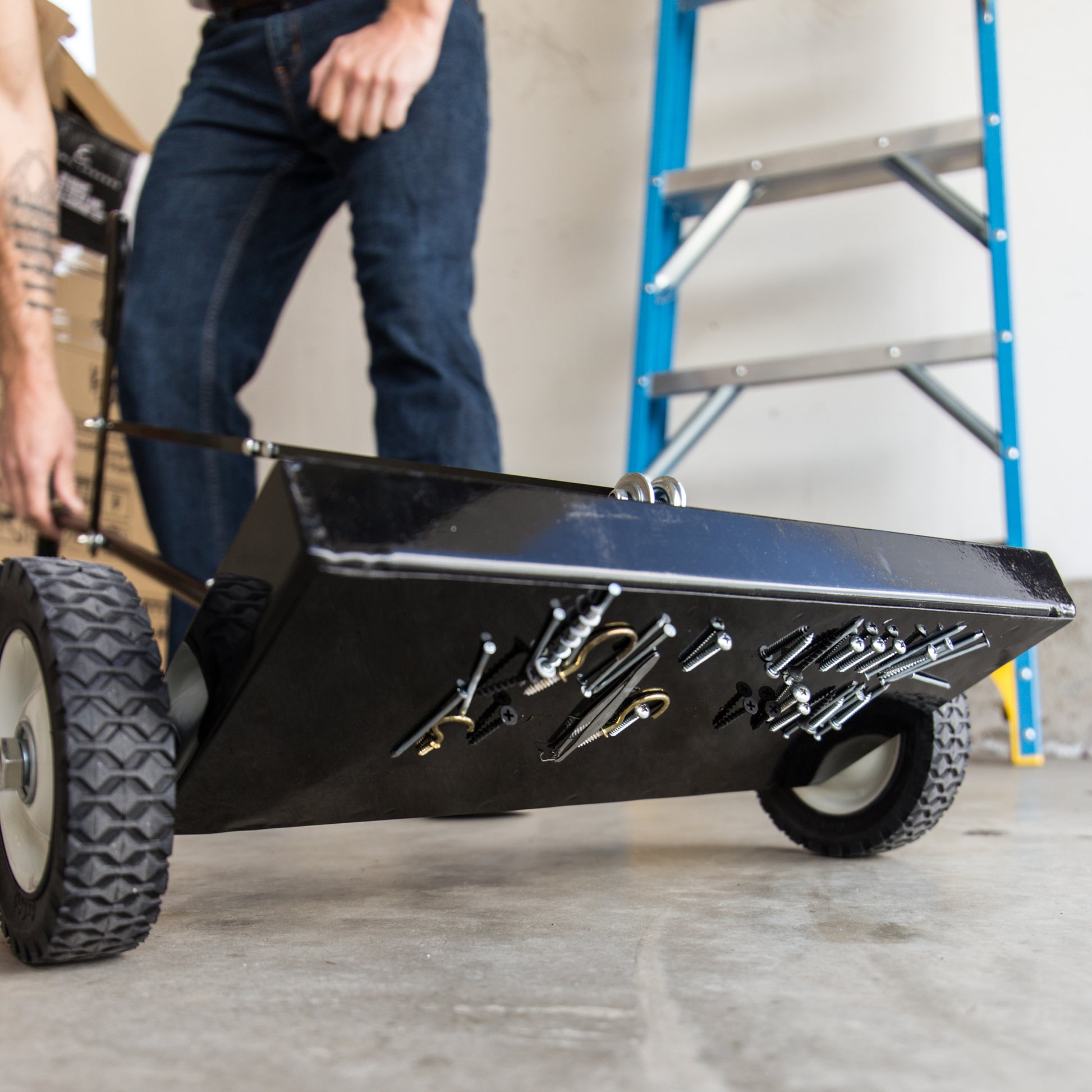 Load image into Gallery viewer, MFSM14RX Magnetic Floor Sweeper with Quick Release - In Use