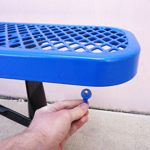 50693 Magnetic Key, M1-69 Blue - In Use Hand Holding Blue Magnetic Key next to a metal bench