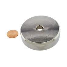 Load image into Gallery viewer, NAC025000NBX Neodymium Countersunk Round Base Assembly - Compared to Penny for Size Reference