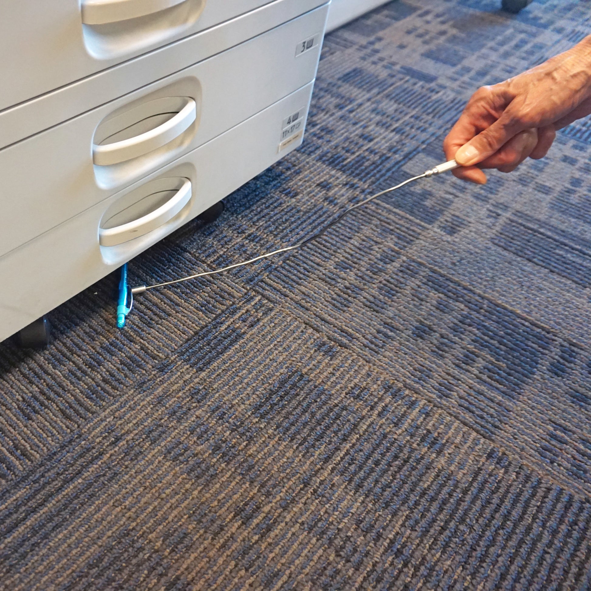 Load image into Gallery viewer, 07229 Bend-It™ Bendable Magnetic Pick-up Tool - In Use
