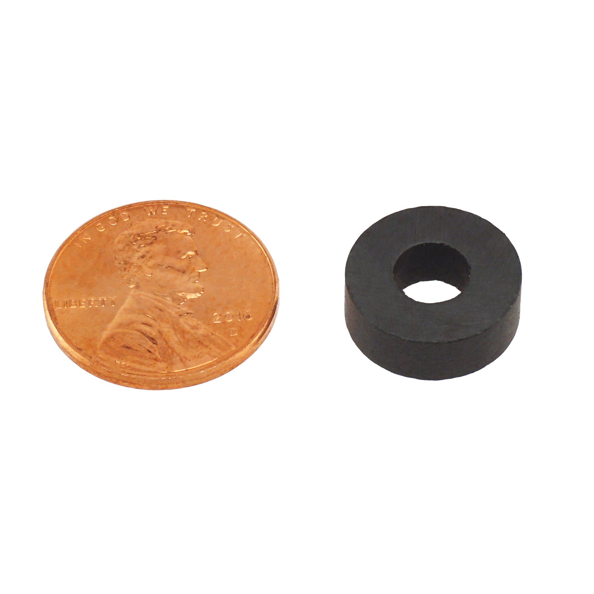 Load image into Gallery viewer, CR552282C Ceramic Ring Magnet - Compared to Penny for Size Reference