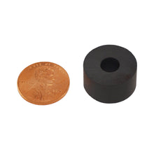 Load image into Gallery viewer, CR74RMXC Ceramic Ring Magnet - Compared to Penny for Size Reference