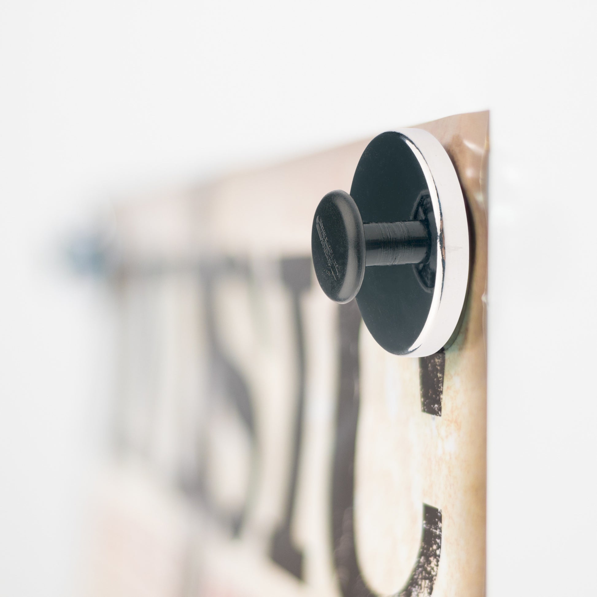 Load image into Gallery viewer, HMKR-50 Ceramic Round Base Magnet with Knob - In Use