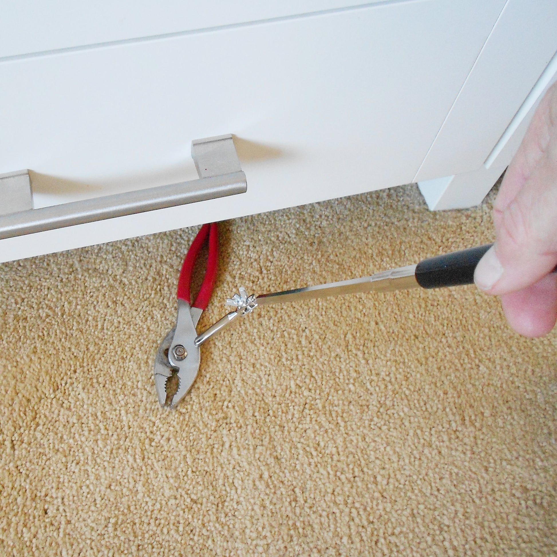 Load image into Gallery viewer, 07256 Extendable Magnetic Pick-Up Tool with Locking Hinge - In Use