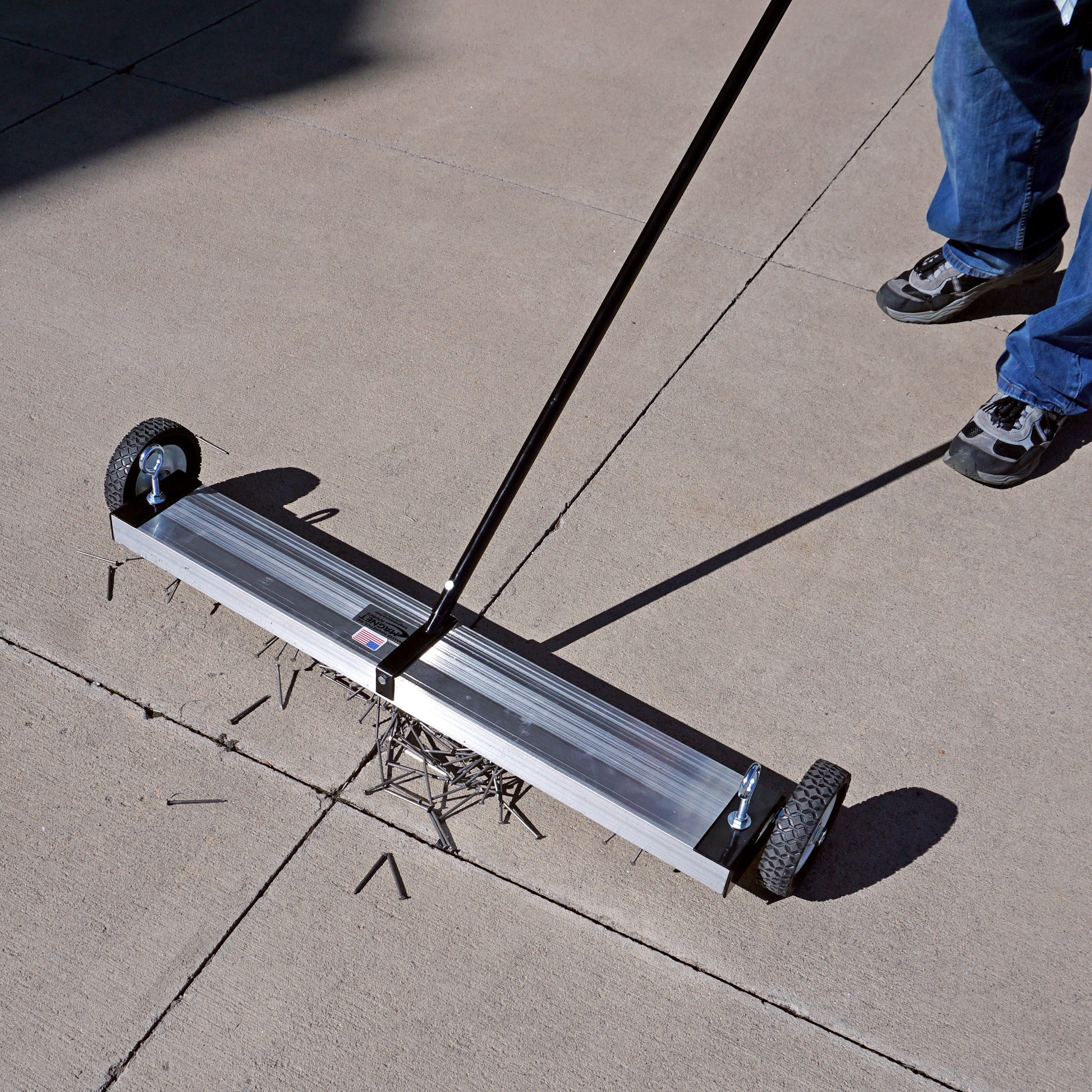 Load image into Gallery viewer, MFSM36 Magnetic Floor Sweeper - Man Sweeping Metal Debris Off Sidewalk