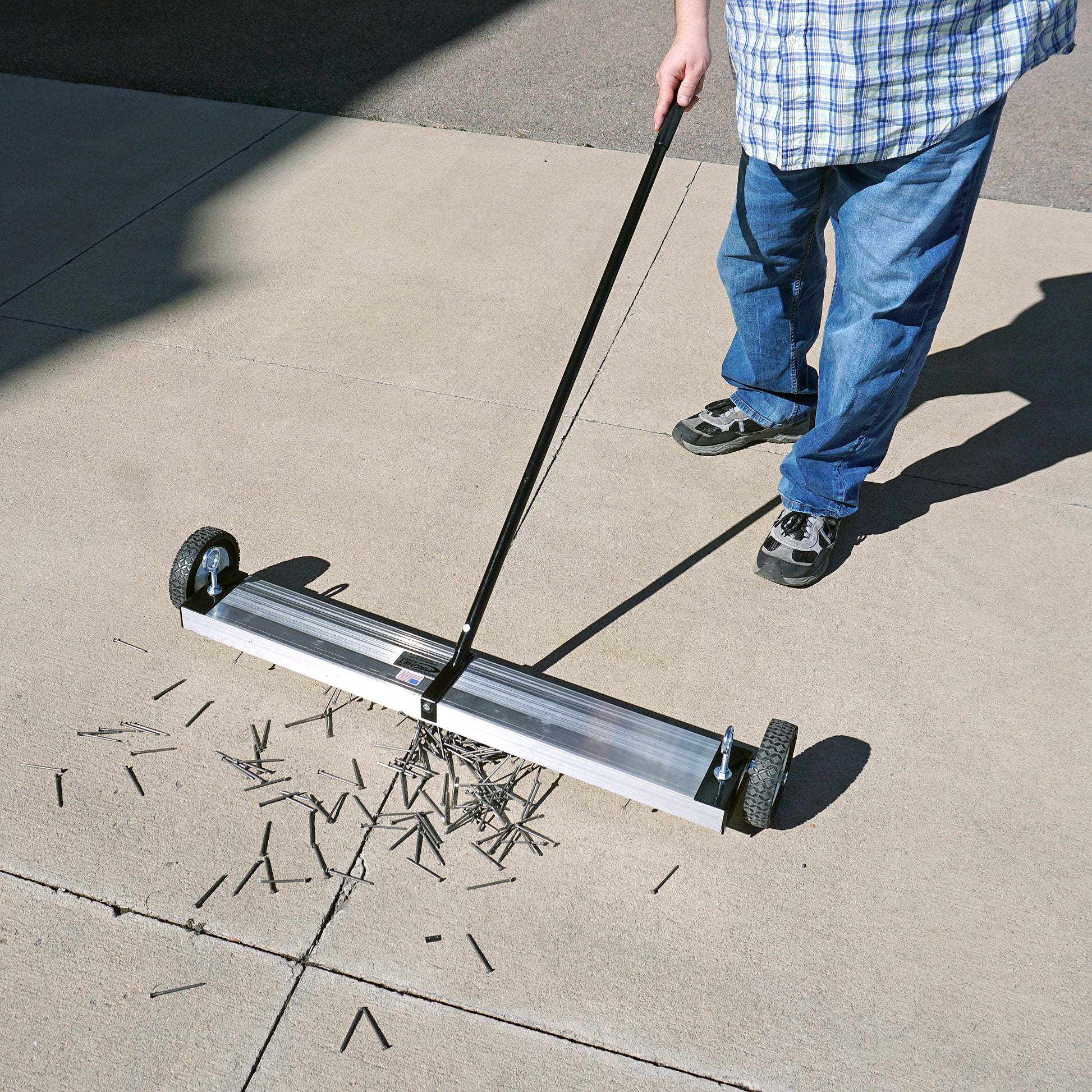 Load image into Gallery viewer, MFSM36 Magnetic Floor Sweeper - Man Sweeping Debris off Sidewalk