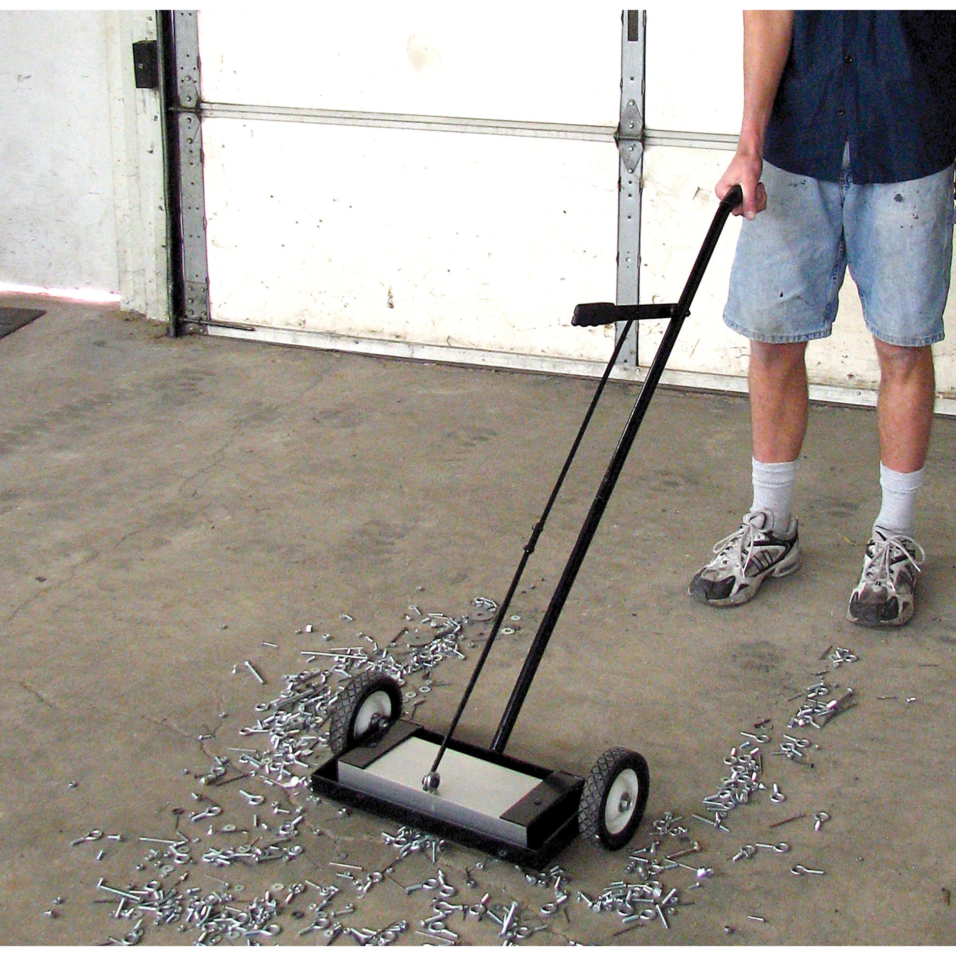 Load image into Gallery viewer, MFSM14RX Magnetic Floor Sweeper with Quick Release - In Use