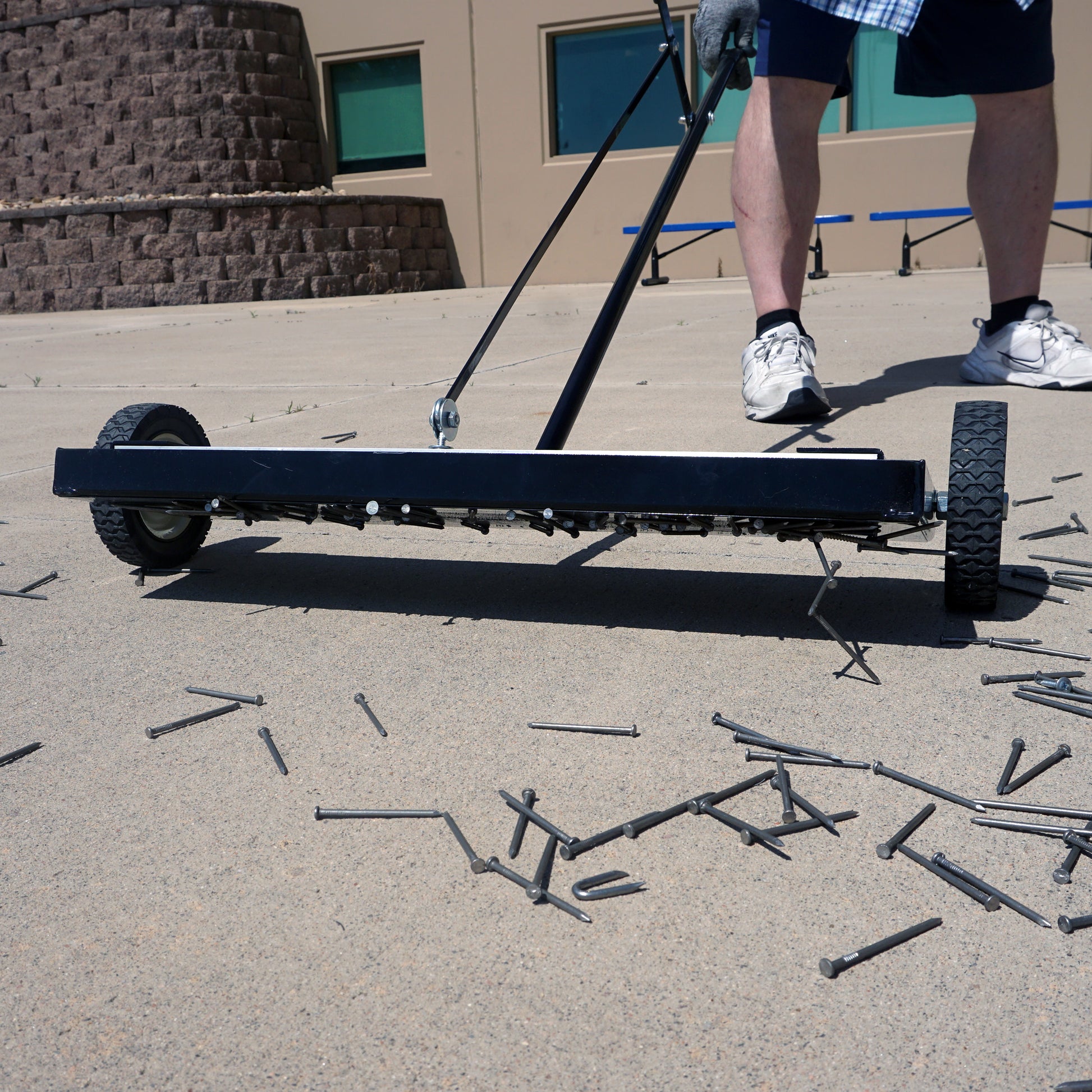 Load image into Gallery viewer, MFSM24RX Magnetic Floor Sweeper with Quick Release - In Use