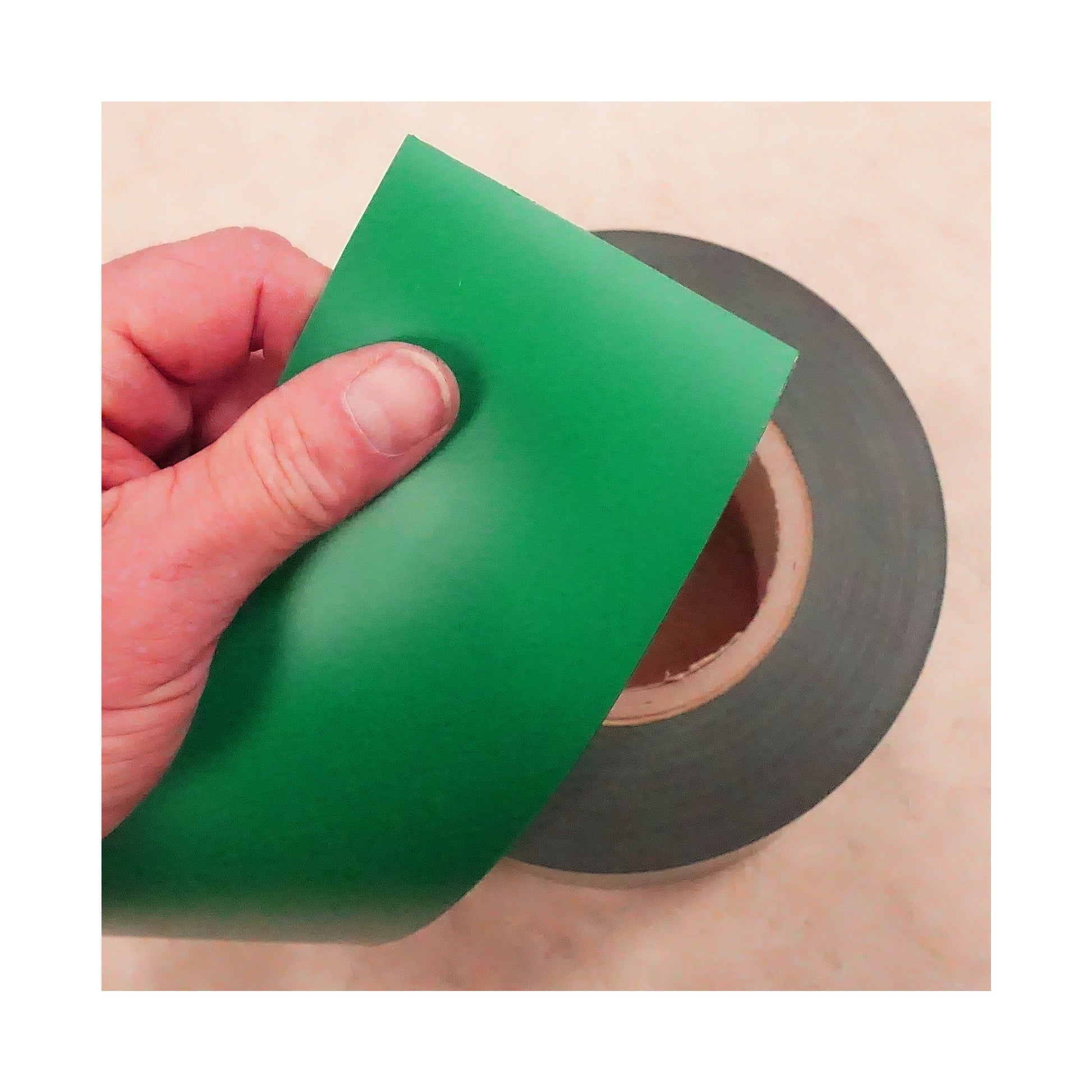 Load image into Gallery viewer, ZGN03090GR/WKS50 Magnetic Labeling Strip with Green Vinyl Surface - In Use