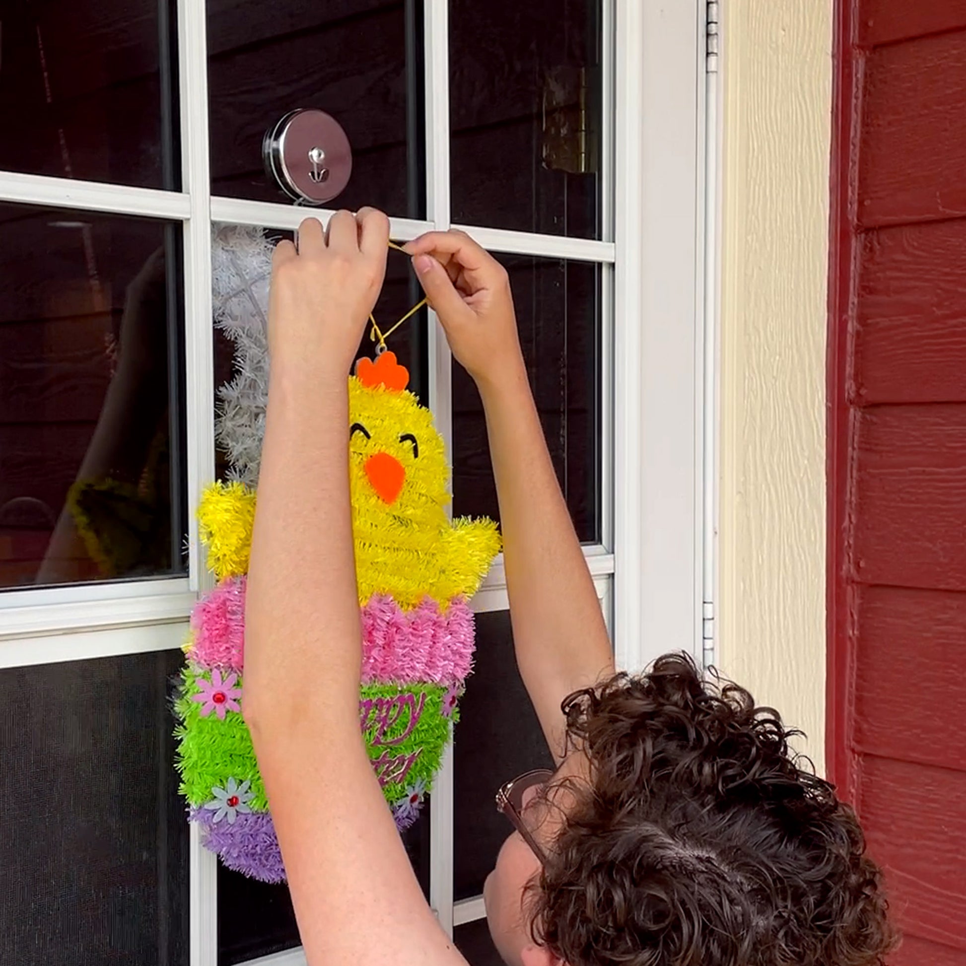 Load image into Gallery viewer, 07254 Magnetic Window Decor Hooks (2pk) - Woman Placing Birthday Decoration On Magnet on Door with Windows