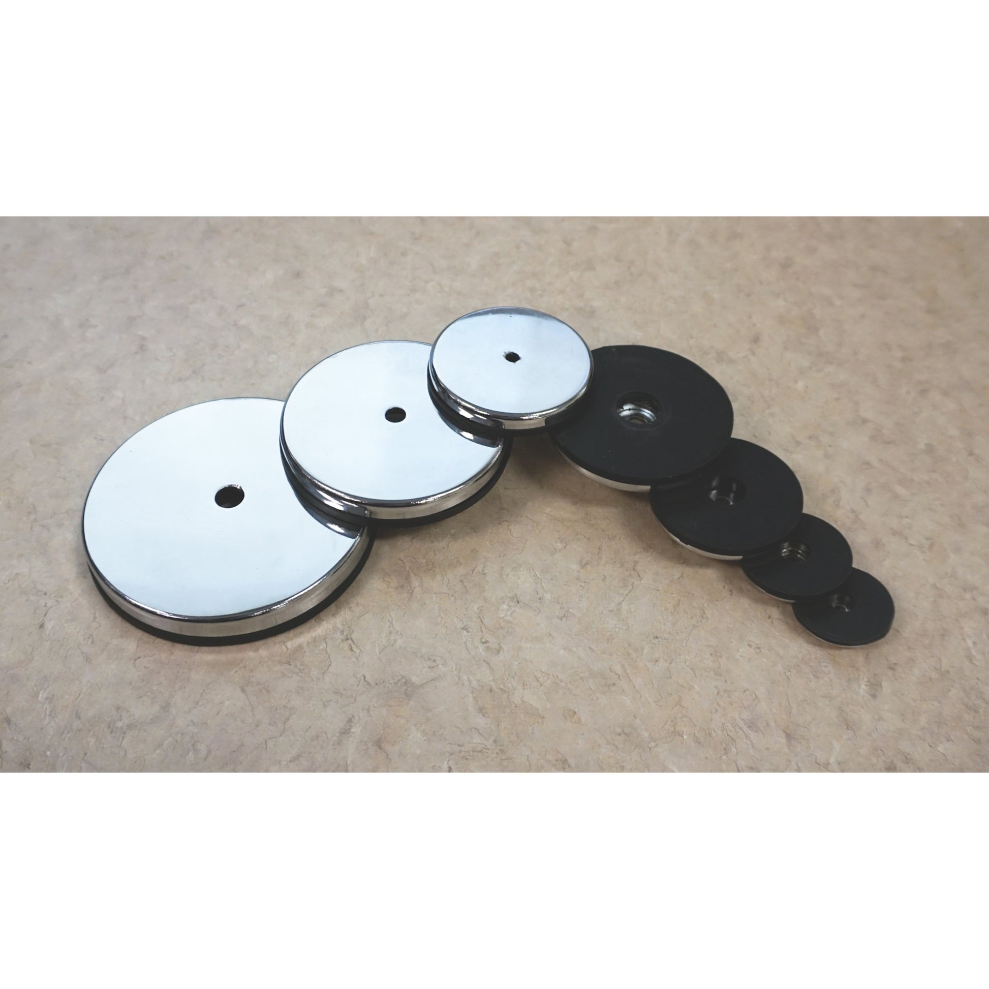 Load image into Gallery viewer, 07625 NeoGrip™ Round Base Magnet - Laid out on Table