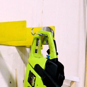 RB70PG-NEOBX NeoGrip™ Round Base Magnet - In Use Holding a Heavy Tool