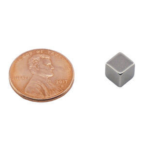 NB002557N Neodymium Block Magnet - Compared to Penny for Size Reference