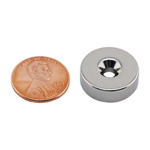Load image into Gallery viewer, NR007518NCTS Neodymium Countersunk Ring Magnet - Compared to Penny for Size Reference