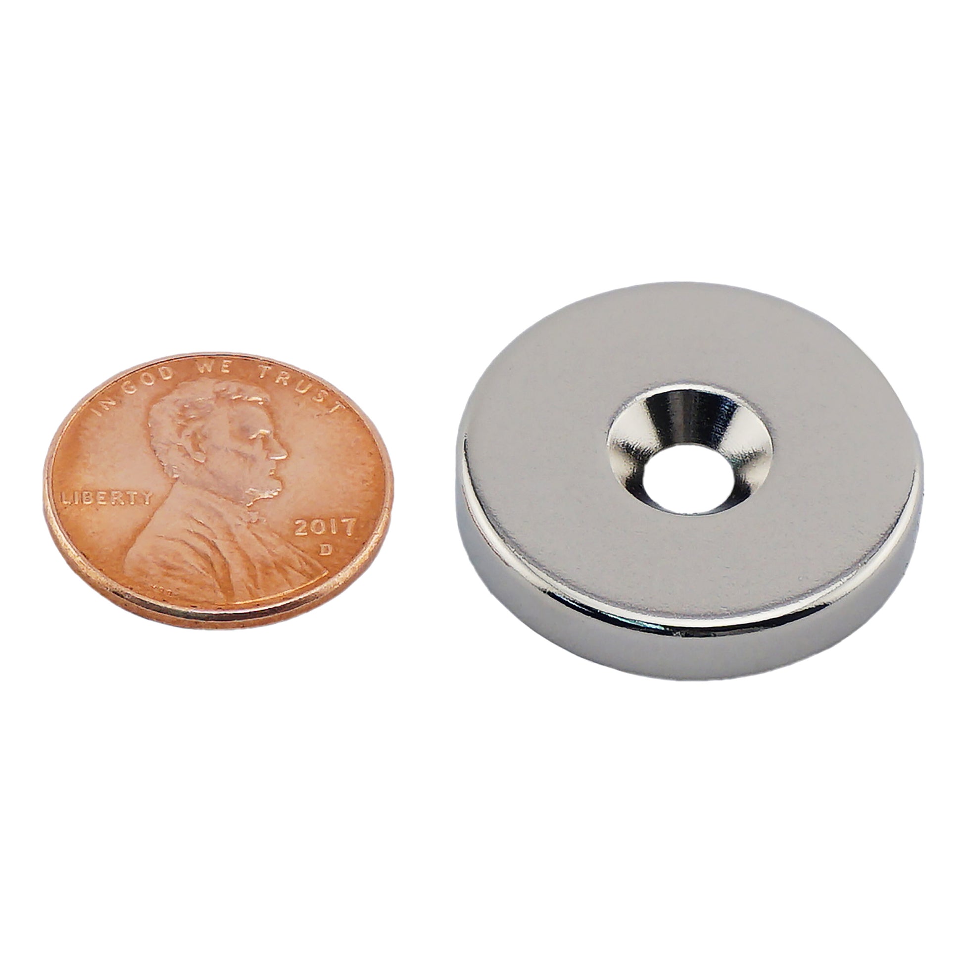 Load image into Gallery viewer, NR010020NCTS Neodymium Countersunk Ring Magnet - Compared to Penny for Size Reference