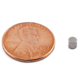 ND001209N Neodymium Disc Magnet - Compared to Penny for Size Reference