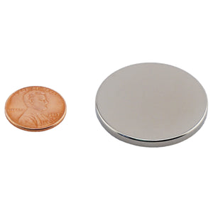 ND012505N Neodymium Disc Magnet - Compared to Penny for Size Reference