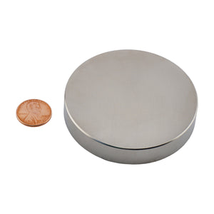 ND020009N Neodymium Disc Magnet - Compared to Penny for Size Reference