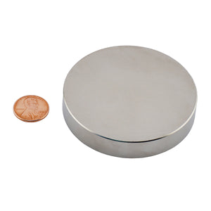 ND027502N Neodymium Disc Magnet - Compared to Penny for Size Reference