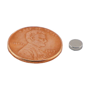 ND308N-35 Neodymium Disc Magnet - Compared to Penny for Size Reference