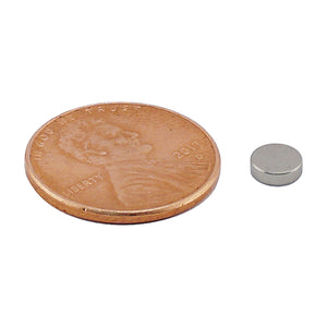 ND45-1905N Neodymium Disc Magnet - Compared to Penny for Size Reference