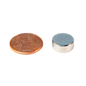 ND45-5020N Neodymium Disc Magnet - Compared to Penny for Size Reference