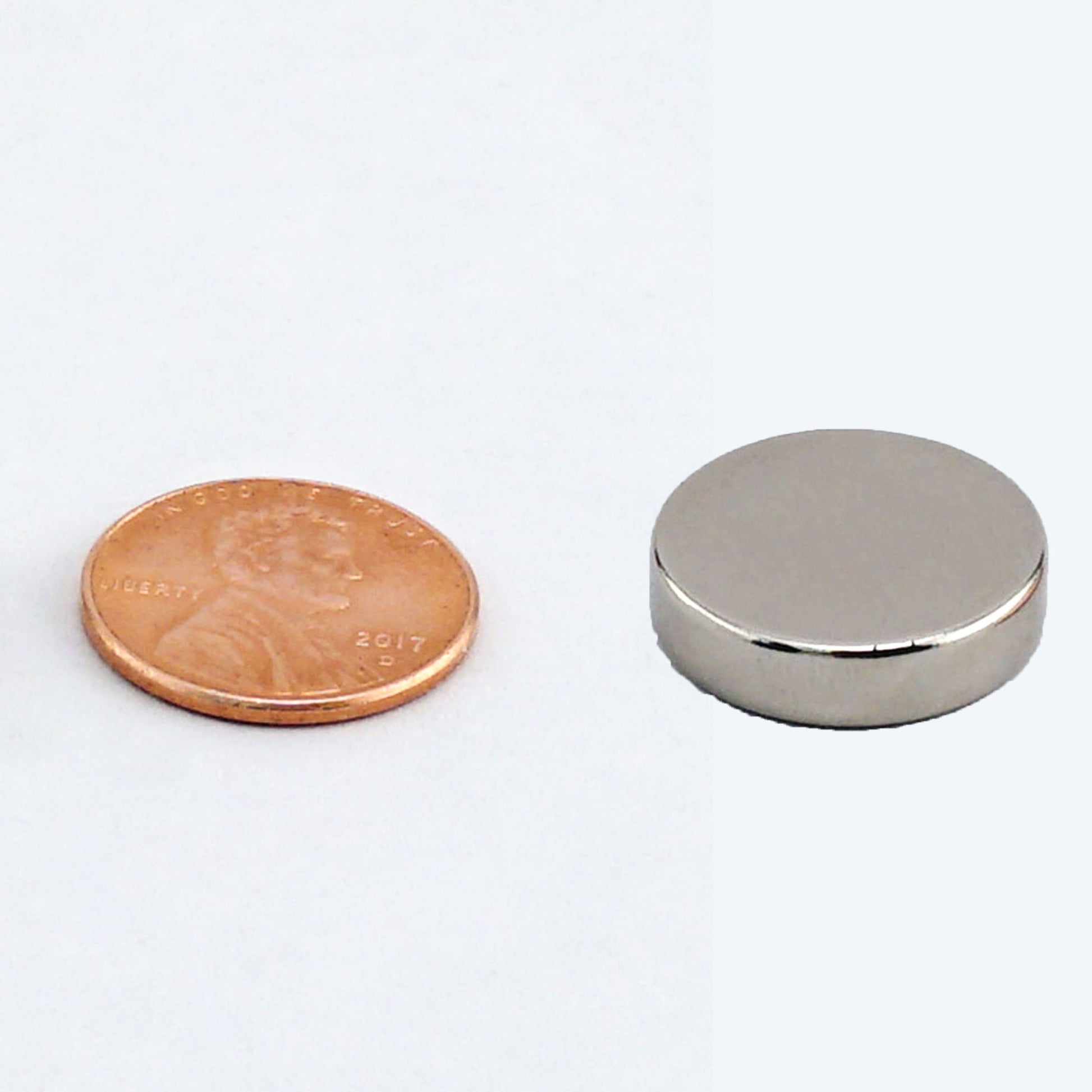 Load image into Gallery viewer, ND45-8706N Neodymium Disc Magnet - Compared to Penny for Size Reference