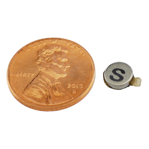 FTND25S Neodymium Disc Magnet with Adhesive - Compared to Penny for Size Reference