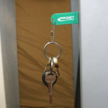 Load image into Gallery viewer, KCMG-BULK Neodymium Key Chain Magnet with Logo, Green - Green Magnet with Keys on Treadmill