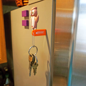 KCMO-BULK Neodymium Key Chain Magnet with Logo, Orange - Orange Magnet on Silver Refrigerator