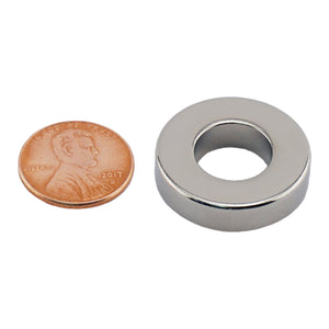 NR010012N Neodymium Ring Magnet - Compared to Penny for Size Reference