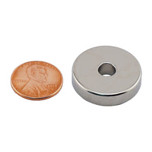 Load image into Gallery viewer, NR010024N Neodymium Ring Magnet - Compared to Penny for Size Reference