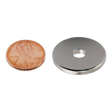 Load image into Gallery viewer, NR010025NS01 Neodymium Ring Magnet - Compared to Penny for Size Reference