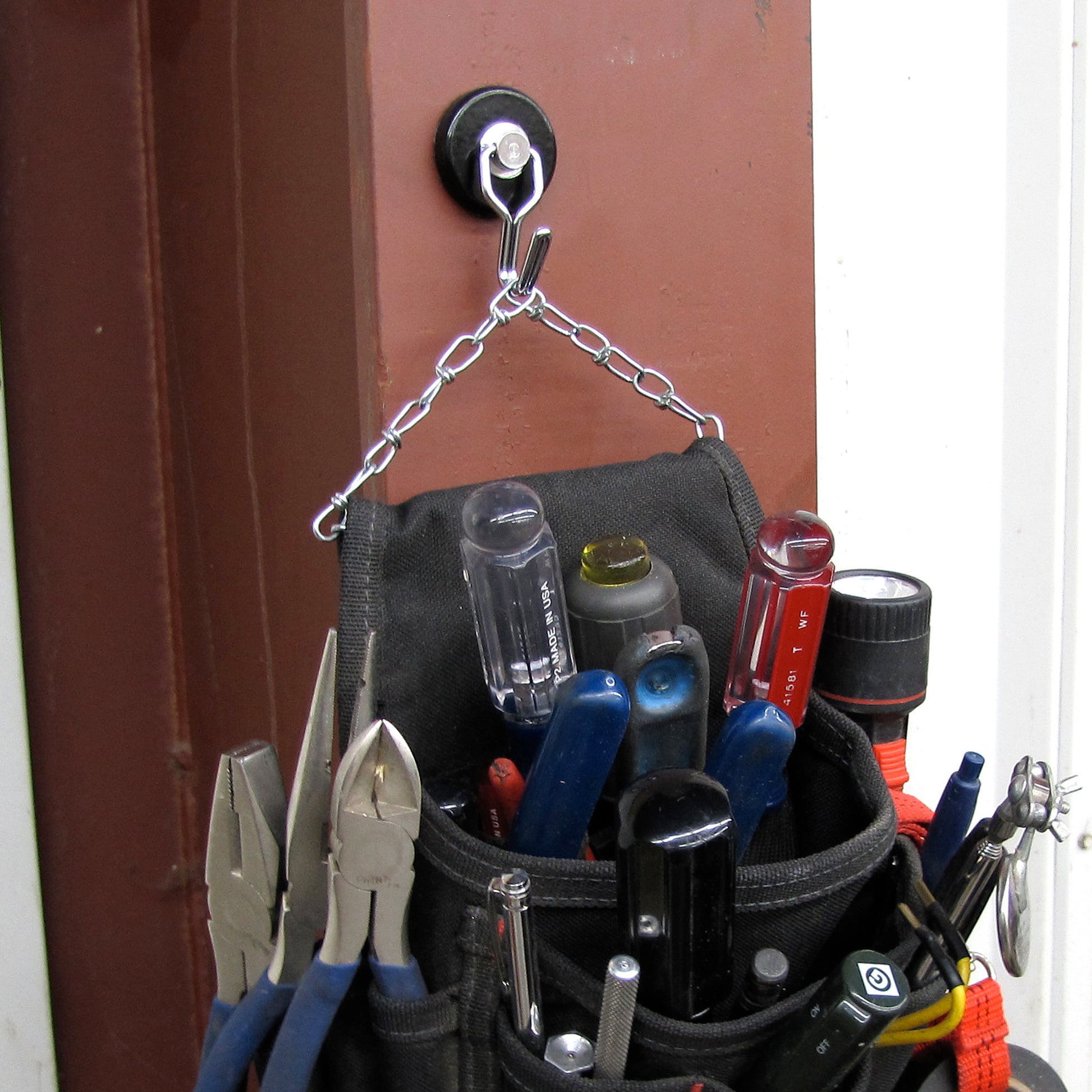 Load image into Gallery viewer, 07580 Neodymium Rotating and Swinging Magnetic Hook - In Use