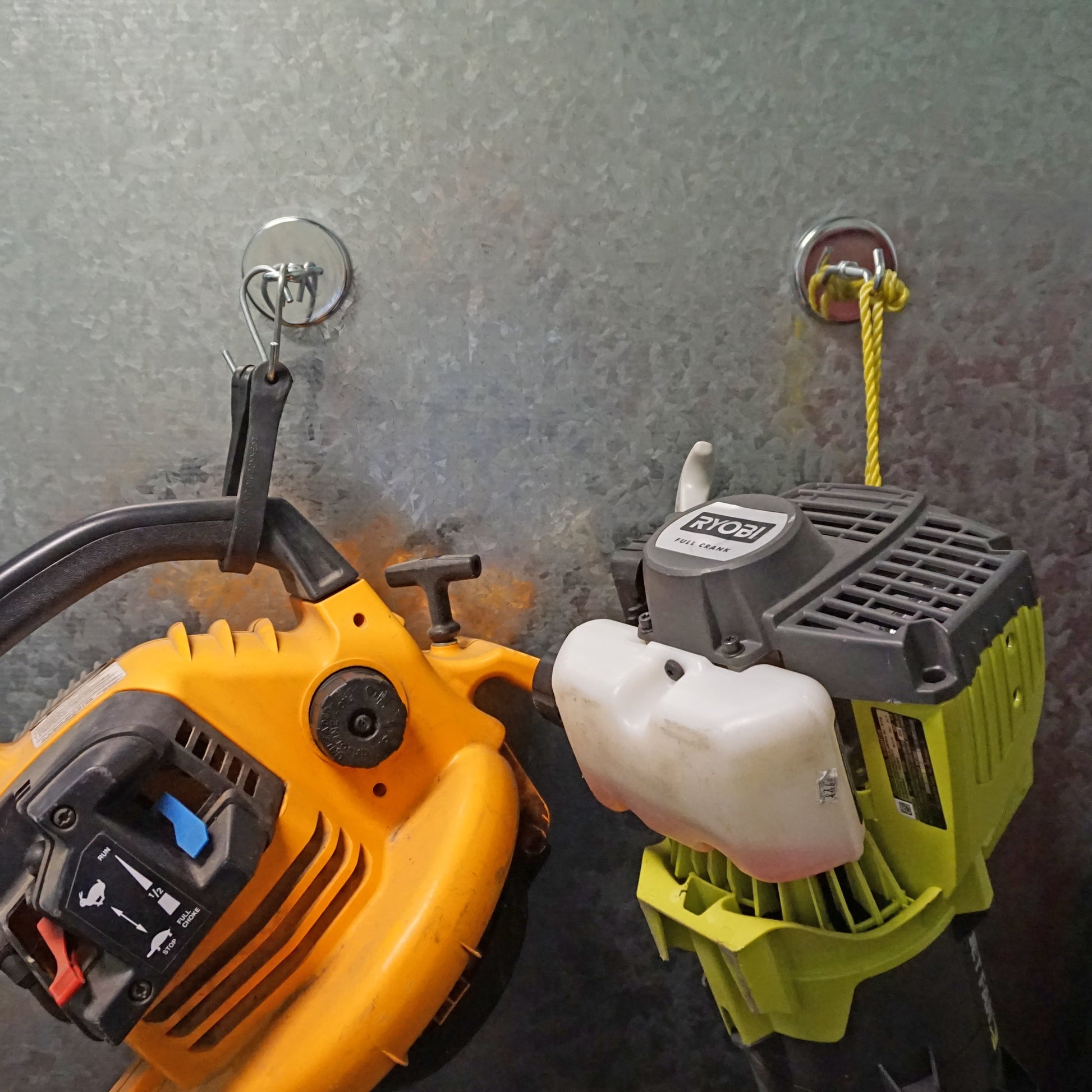 Load image into Gallery viewer, RB70BL-NEOBX Super Blue™ Neodymium Round Base Magnet - Demonstration of Heavy Tools Hanging from Magnetic Hooks