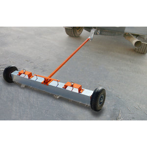VSM-48 VersaSWEEP™ 4-in-1 Magnetic Sweeper with Quick Release - Sweeper being pulled behind a truck