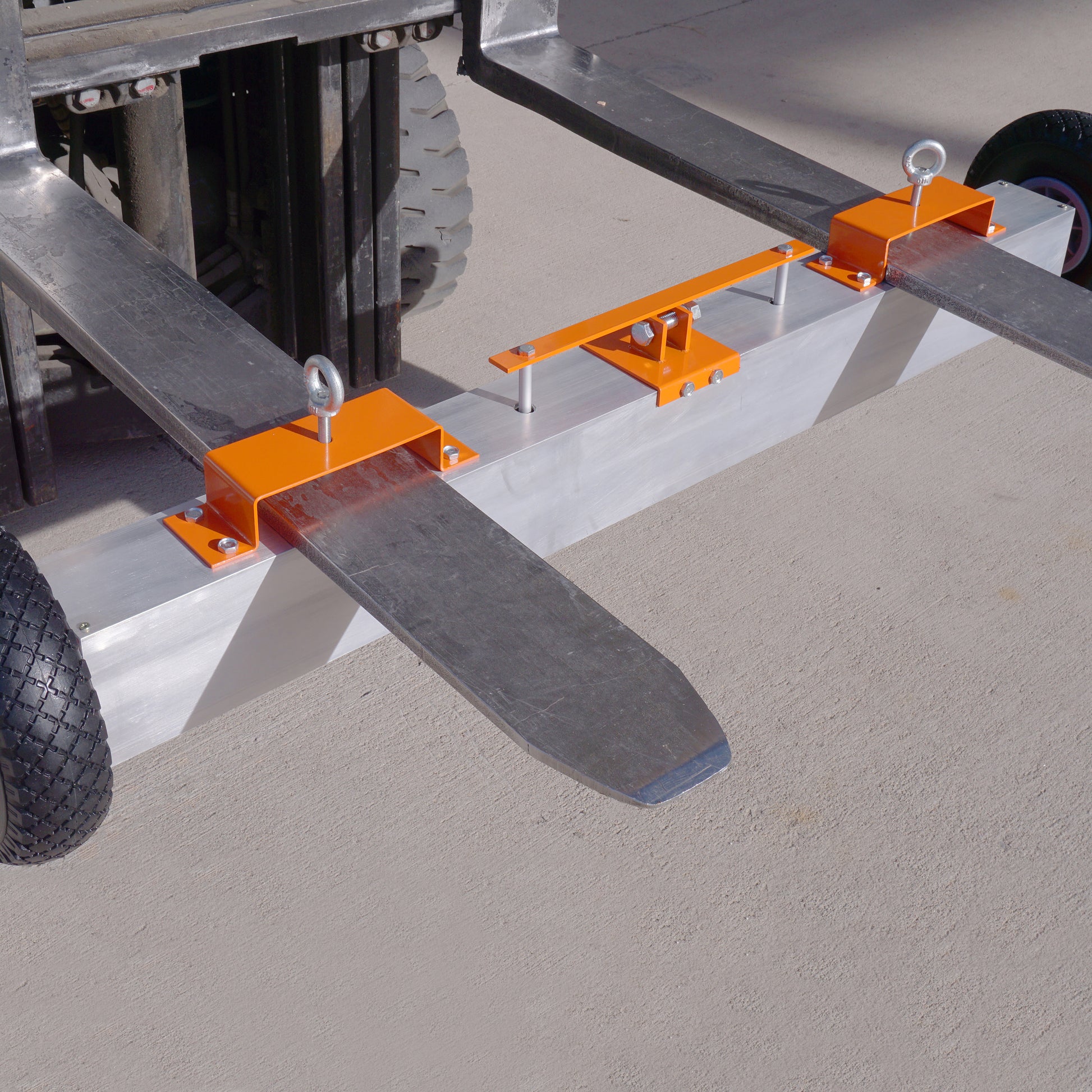 Load image into Gallery viewer, VSM-60 VersaSWEEP™ 4-in-1 Magnetic Sweeper with Quick Release - Eyebolt Screwed into Forklift Mount with Wheels