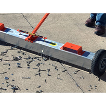 Load image into Gallery viewer, VSM-60 VersaSWEEP™ 4-in-1 Magnetic Sweeper with Quick Release - Closeup View of Sweeper Removing Debris from Sidewalk