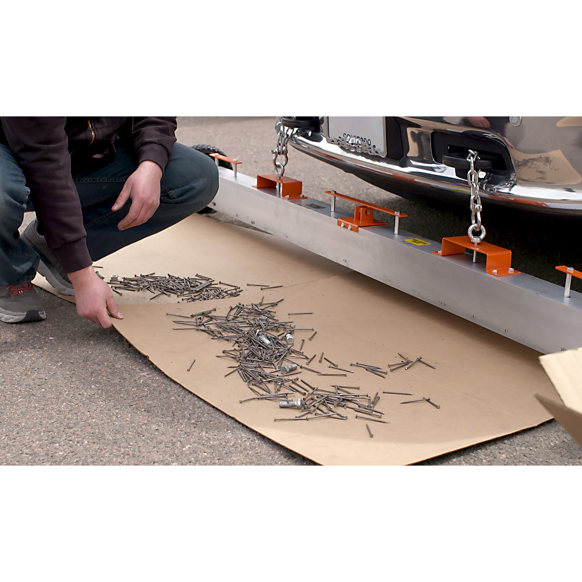 Load image into Gallery viewer, VSM-84 VersaSWEEP™ 4-in-1 Magnetic Sweeper with Quick Release - Cardboard Holding Debris that Was Picked Up by Sweeper