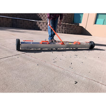 Load image into Gallery viewer, VSM-84 VersaSWEEP™ 4-in-1 Magnetic Sweeper with Quick Release - Pushing Large Debris
