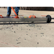 Load image into Gallery viewer, VSM-84 VersaSWEEP™ 4-in-1 Magnetic Sweeper with Quick Release - Closeup of Pushing Large Debris